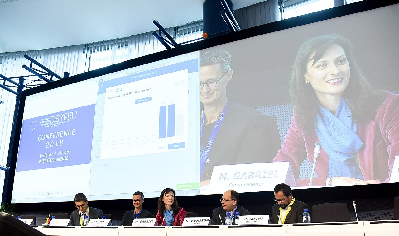 File photo: Panel discussion at the CERT-EU Conference 2018, with cybersecurity presentation material displayed on screen. Illustrative context; not a photograph of the reported event.