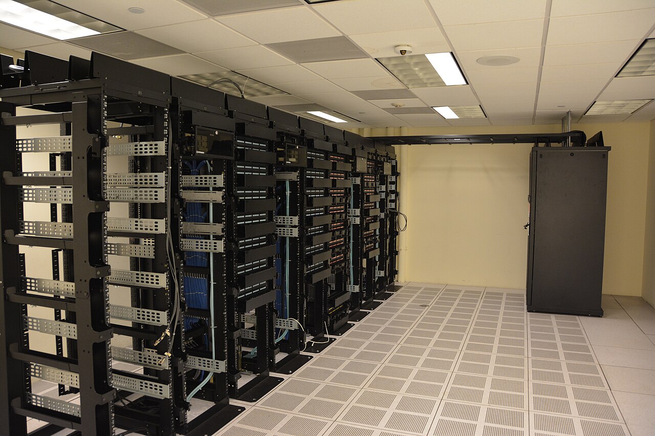 File photo of data-center server racks. Illustrative infrastructure context; not a photograph of an affected organization or reported incident.